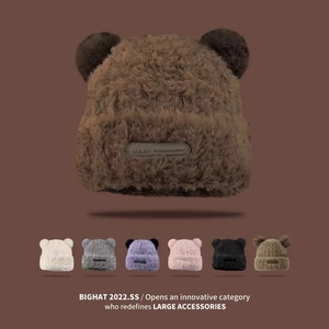 Detail showing plush teddy bear ear beanie texture and color range in high-quality faux fur