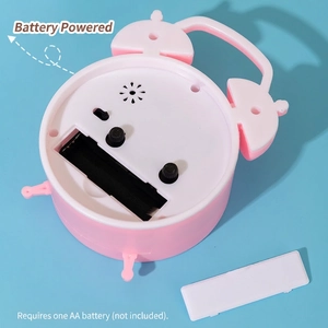 Pink creative silent alarm clock for bedroom showing battery compartment and adjustment knobs