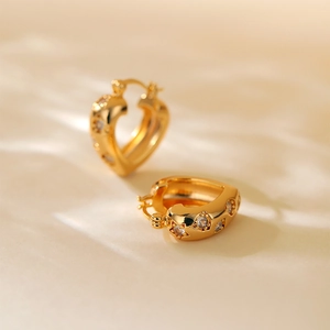 Gold plated heart hoop earrings with sparkling zircon crystals for a trendy stylish look