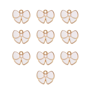 Set of ten white enamel bow pendants with gold edges for DIY jewelry making
