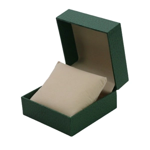 Dark green faux leather watch box with beige velvet cushion for bracelet storage