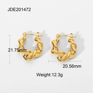 Chunky gold twisted croissant hoop earrings in polished 18k gold plated stainless steel