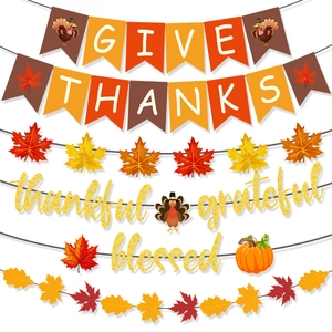 Detail of Thanksgiving banner set with maple leaves, turkey motifs and orange glitter letters