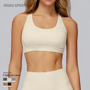 Cross-back yoga sports bra in cream white with comfortable fitted athletic design