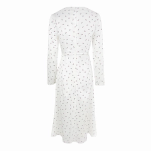 Detail view of the back of a floral long-sleeved dress with an invisible zipper closure