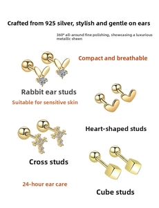 Detail view of S925 sterling silver stud earrings in heart and cross shapes with fine polish