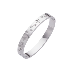 Detailed side view of silver star pattern bangle with inlaid rhinestones and snap clasp