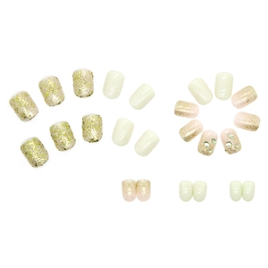 Press-on nails in fresh melon green and milk white with glitter and green rhinestones