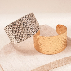 Irregular textured wide cuff bracelets in polished gold and silver metal finish