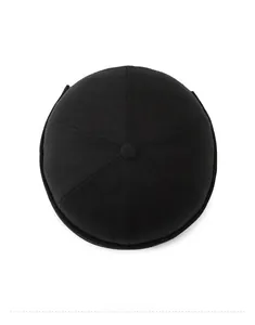 Top down view of black docker hat showing six-panel stitch and twill cotton texture