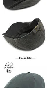 Detail of herringbone fabric and metal side buckle on flat caps in gray and blue