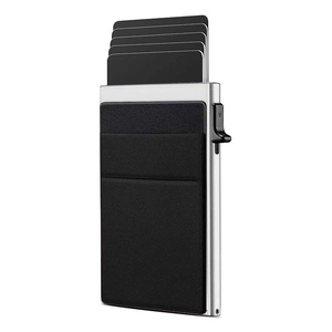 Detail of RFID metal card holder showing automatic pop-up mechanism and slim black frame