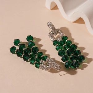 Elegant green crystal tassel drop earrings with sparkling rhinestones in a luxury style