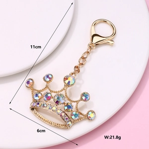 Detail view of gold crown keychain with colorful rhinestones and 11cm length dimensions