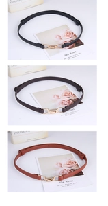 Detailed trio of thin leather belts in black, coffee, and tan with gold buckles