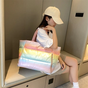 Iridescent quilted tote bag with large capacity shown in a stylish lifestyle setting