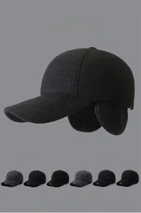 Detail showing foldable earflaps and AR metal logo on winter thermal baseball cap
