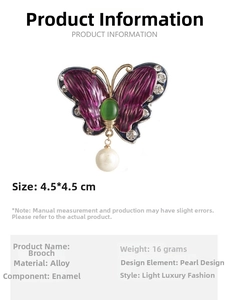Detail of a purple enamel butterfly brooch with a white pearl and green gemstone