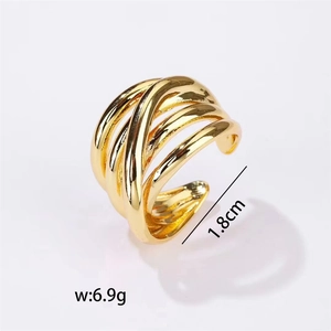 Detailed view of gold multi-layer crisscross ring with 1.8cm diameter and 6.9g weight