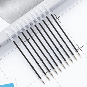 Close-up of replacement black ink refills with transparent body and silver tips