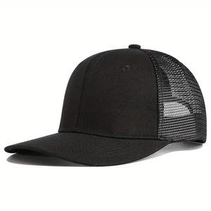 Detail of a black trucker hat with breathable nylon mesh and curved visor for outdoor sun protection
