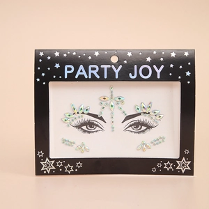Detail view of silver iridescent face rhinestones in Party Joy branded star card packaging