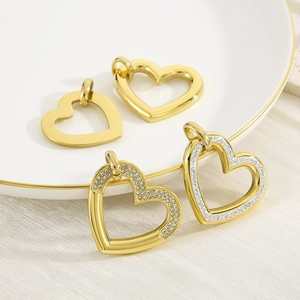 18K gold plated heart pendants with rhinestones on a white plate background
