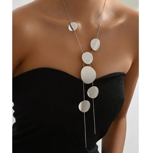 Silver layered long necklace with irregular hollow geometric discs for a trendy look