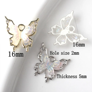 Sparkly butterfly charms for jewelry making with crystal resin and metal borders