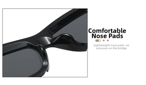Close-up of lightweight black sunglasses featuring comfortable integrated nose pads