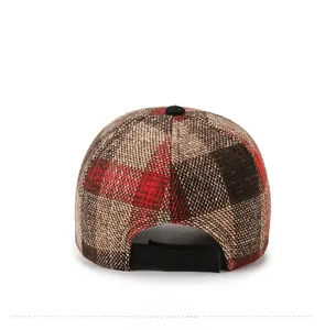Detail view of the back of plaid wool baseball cap with adjustable Velcro strap