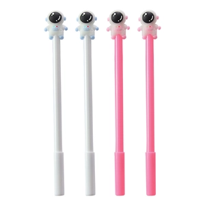 Set of four cute astronaut pens in white and pink with soft silicone cartoon character tops