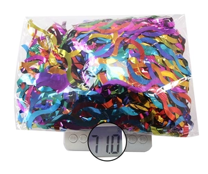 Rainbow gradient tinsel table skirt fringe shown on a digital scale weighing 71.0g