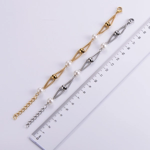 Measurement of a freshwater pearl bracelet with steel charm showing a length of 19cm