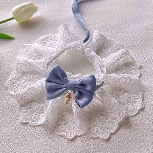 Elegant white lace pet collar with a light blue bow and pearl pendant for cats