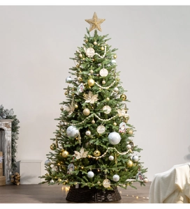 Decorated Christmas tree with golden stars, LED warm lights, and festive ornaments
