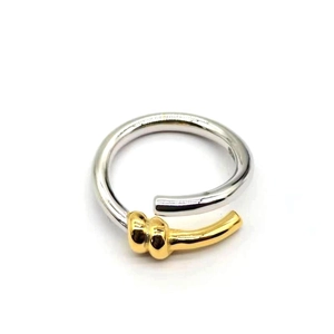 Minimalist S925 sterling silver open ring with gold twisted knot detail on white background