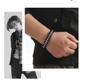 Close-up and lifestyle view of a braided leather bracelet with silver metal segments