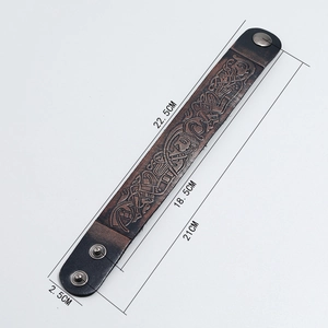 Vintage brown leather wristband with embossed patterns and detailed size measurements
