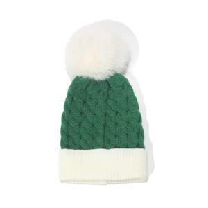Winter knit beanie for kids in green and white with a fluffy faux fur pom-pom topper