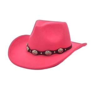 Close-up of pink wool felt western cowboy hat with vintage silver floral relief buckles