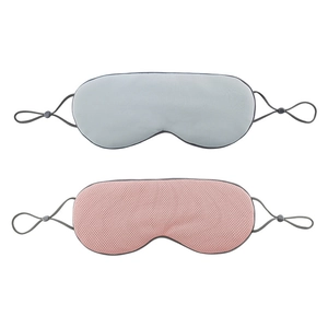Breathable sleep eye mask in blue and pink colors with adjustable straps for light blocking
