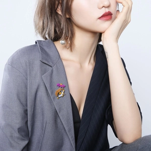 Cute cartoon hedgehog enamel brooch with purple flower on a grey suit lapel