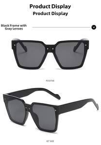 Detail view of black square oversized sunglasses with chic golden rivets on the frame