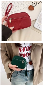 Detail of red and green mini coin purses featuring premium lychee pattern leather