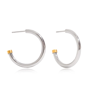 Minimalist silver C-shape stainless steel earrings with gold tips on white background