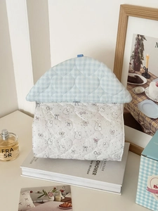 Detail of heart-quilted tissue bag with cute rabbit pattern and blue plaid roof lid