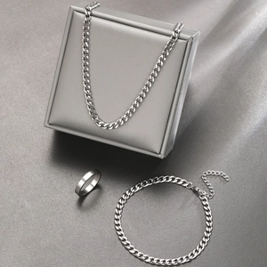 Minimalist silver stainless steel jewelry set with Cuban link chain, bracelet and ring
