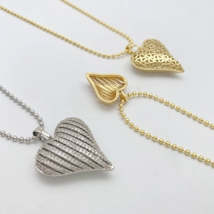 Striped heart pendant necklaces in gold and silver with zircon accents and bead chains