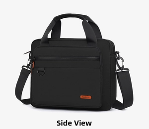 Detail view of black nylon business bag featuring wide handle and orange Fashion label
